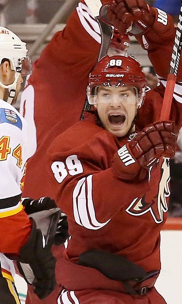Coyotes edge Flames on Doan's milestone goal in third
